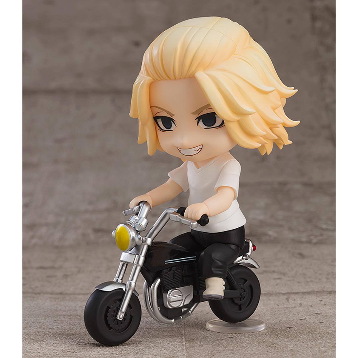Mikey doll shown seated, highlighting articulation