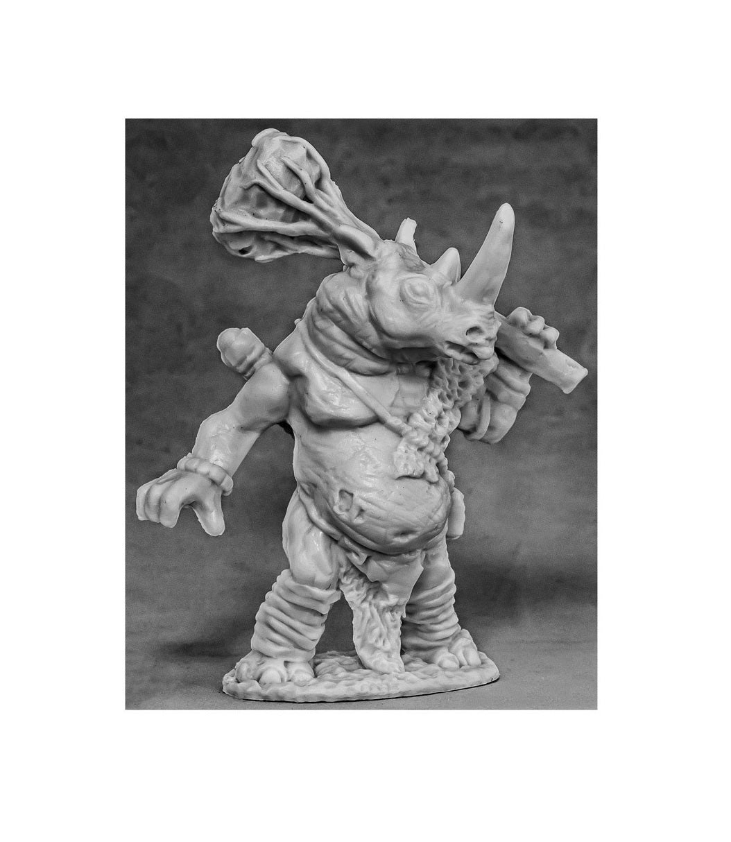 Monochrome miniature of a rhino-man warrior holding a crude, spiked mace over his shoulder