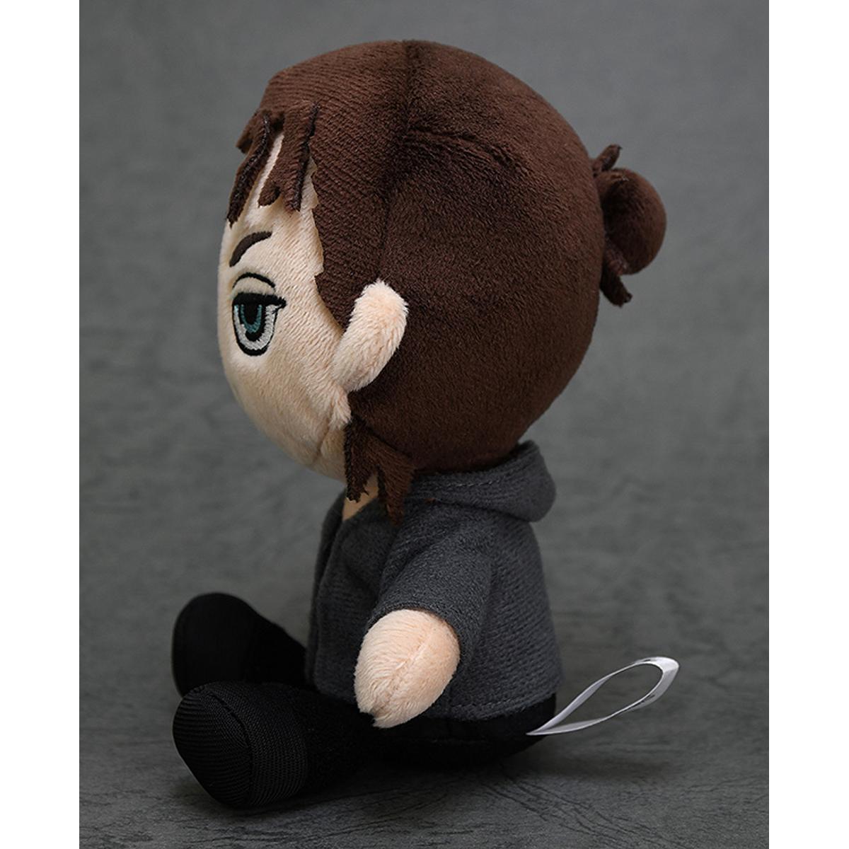 Onyankopon plushie from Attack on Titan wearing a gray hooded jacket and black pants sitting and looking left