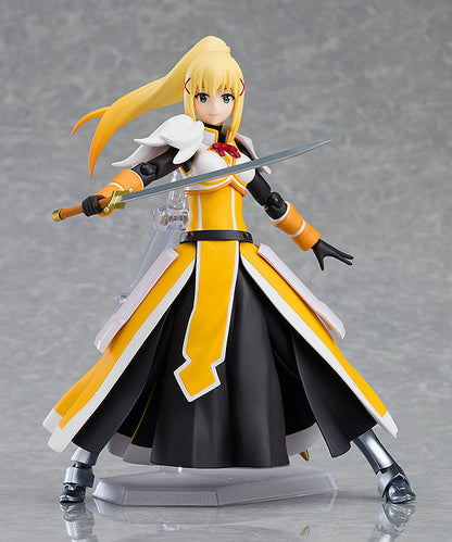 KonoSuba figma Darkness action figure re-run Blonde anime character in yellow and black armor holding a silver sword standing on a clear display base