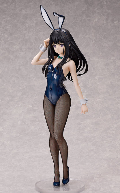 A Lycoris Recoil Takina Inoue figure with black hair, purple eyes, wearing a shiny dark blue bunny suit, fishnet stockings, and heels, standing on a clear base