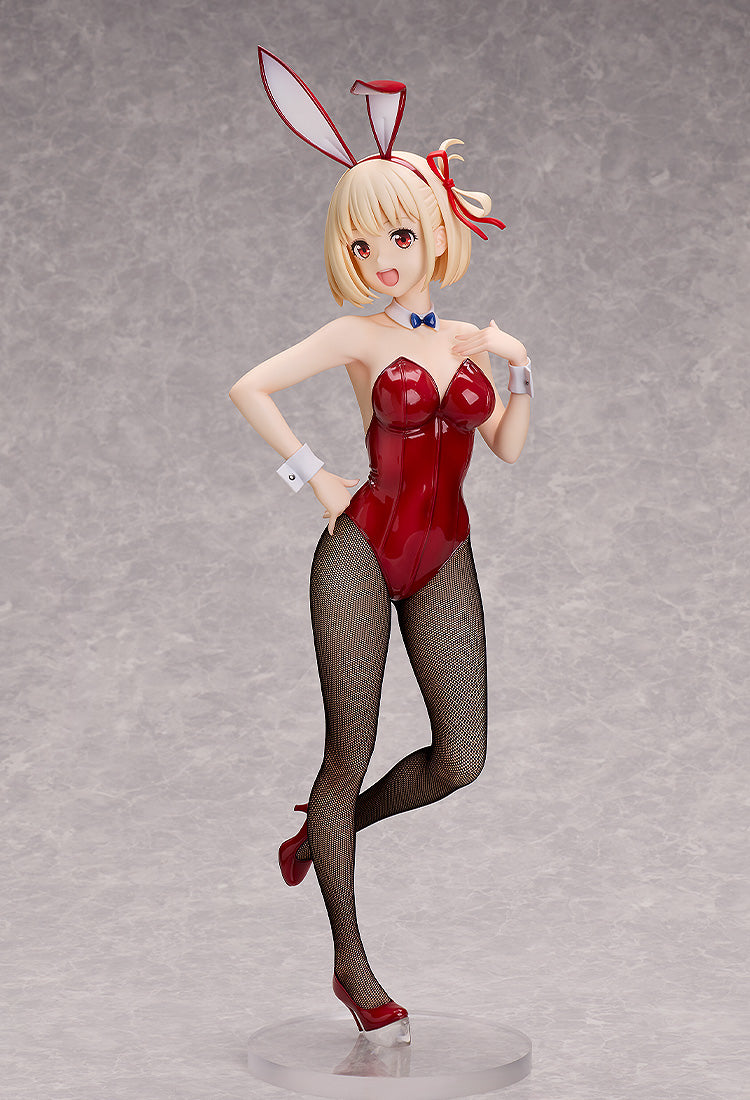 A Chisato Nishikigi Bunny Version scale figure wears a glossy red leotard, fishnet stockings, red heels, bunny ears, and a blue bow tie
