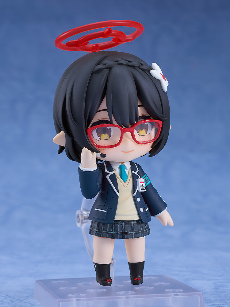 A Nendoroid figure of a dark-haired girl in red glasses, elf ears, a school uniform, and a red halo, wearing a headset