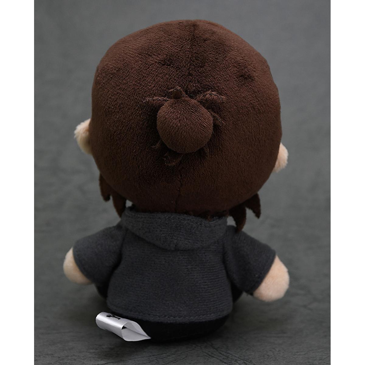 Attack on Titan Onyankopon plushie in a dark grey hoodie with brown hair tied in a bun sitting and facing away