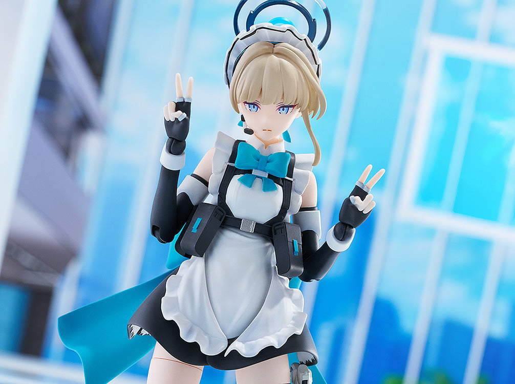 Blonde anime figure in a maid uniform with a blue bow and halo, making peace signs against a bright blue background
