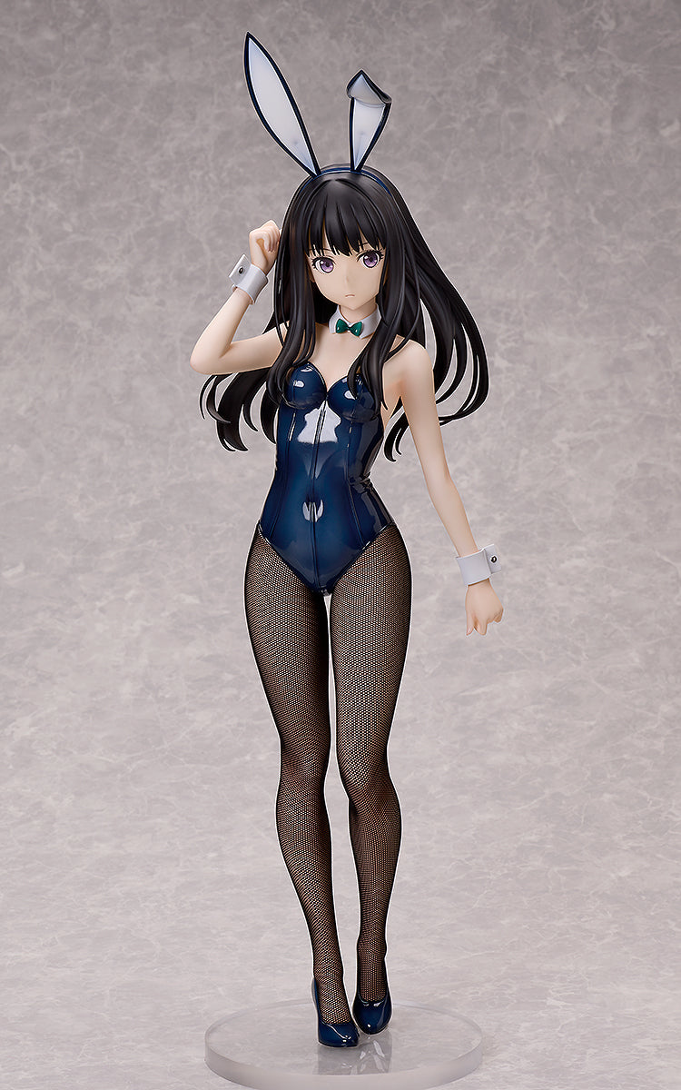 A Takina Inoue bunny version figure wearing a dark blue suit, fishnet stockings, and bunny ears, standing on a clear circular base