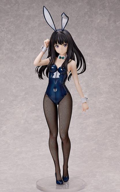A Takina Inoue bunny version figure wearing a dark blue suit, fishnet stockings, and bunny ears, standing on a clear circular base