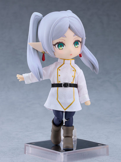 Frieren Beyond Journey's End Nendoroid Doll Frieren figure in white chef's coat black belt dark pants and brown boots posed on a clear stand