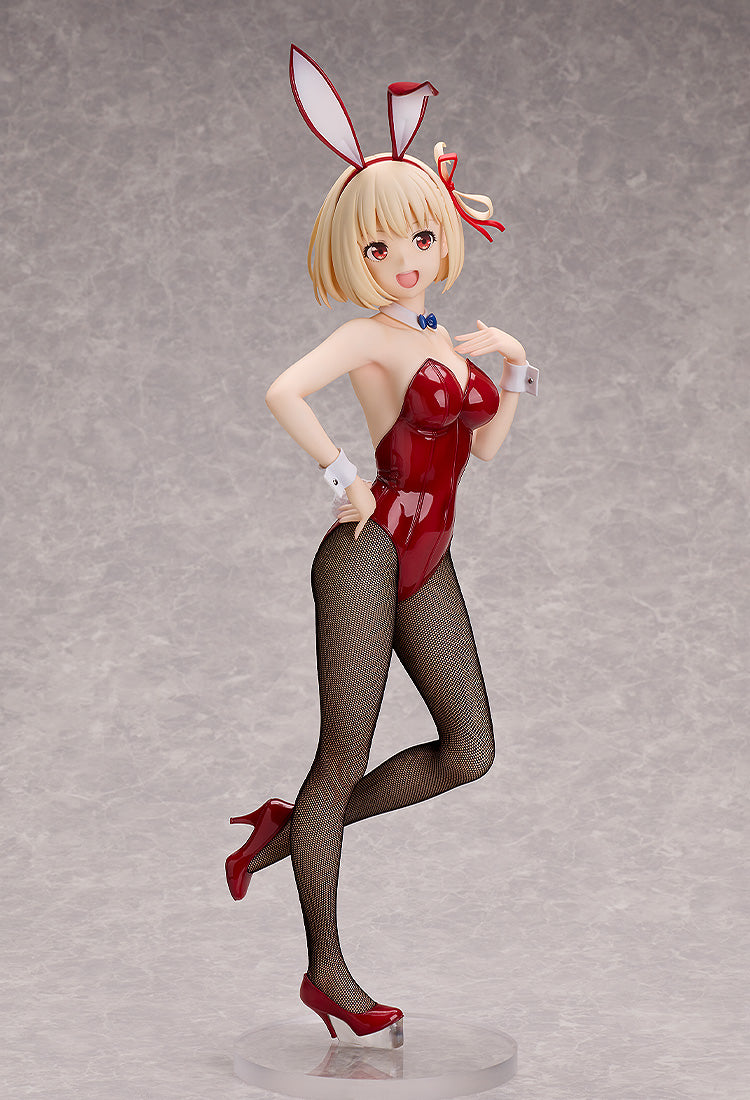 Chisato Nishikigi Bunny Version figure with blonde hair, red eyes, and a red shiny bunny suit, black fishnet stockings, red heels, and bunny ears against a grey background
