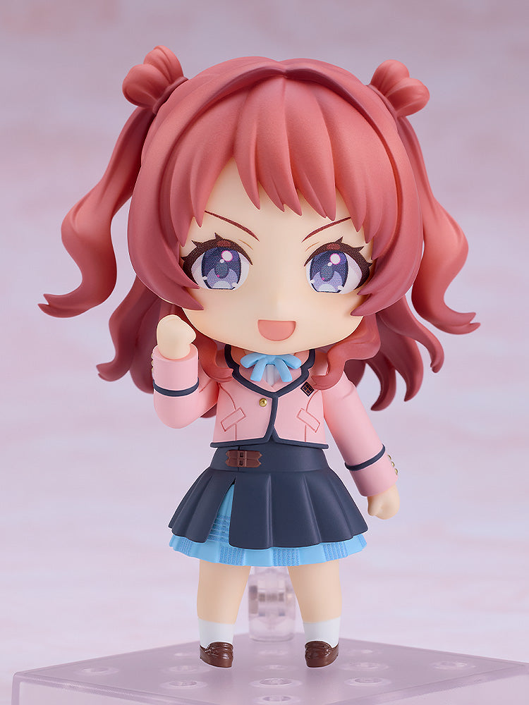 The Good Smile Company Nendoroid Saki Hanami figure displays her with pink twin tails, a cheerful smile, a pink jacket, blue bow, and dark blue pleated skirt