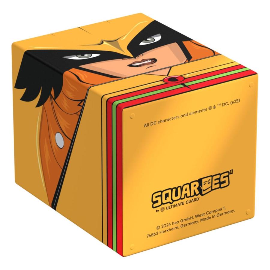 Yellow cube-shaped "SQUARES" box with DC artwork of a masked superhero face, by Ultimate Guard