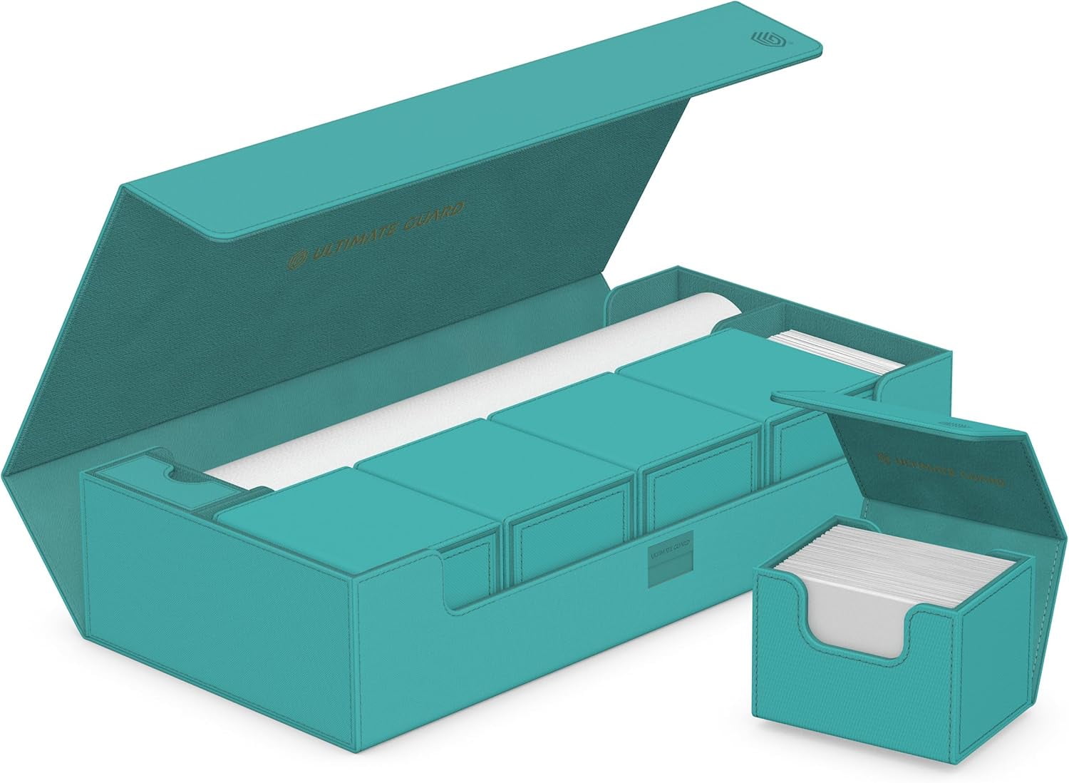 Open turquoise trading card storage box displaying four interior deck cases and stacks of game cards