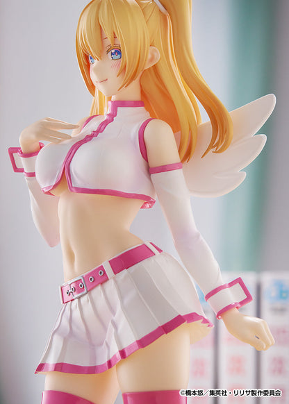 Blonde anime figure with blue eyes, white angel wings, wearing a pink and white crop top and pleated skirt, smiling
