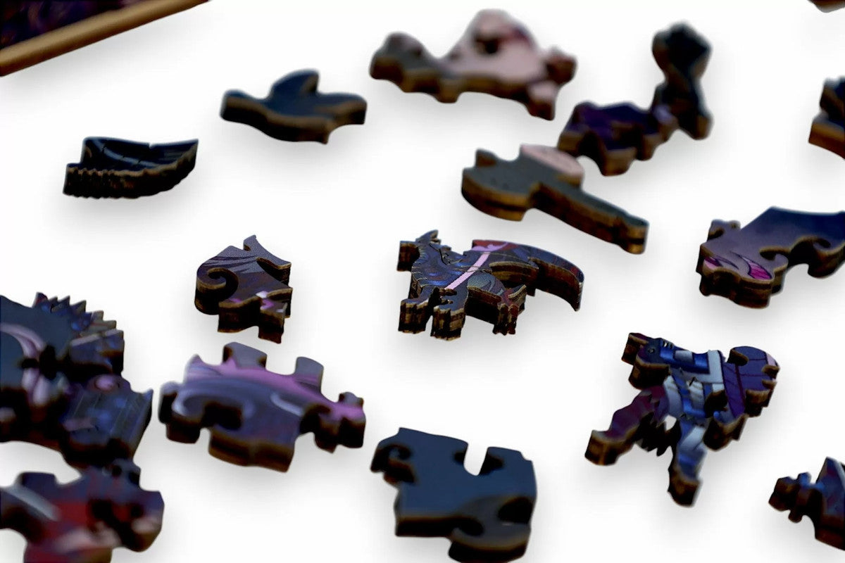 Scattered wooden puzzle pieces, some shaped like a dragon and an axe, on a white background