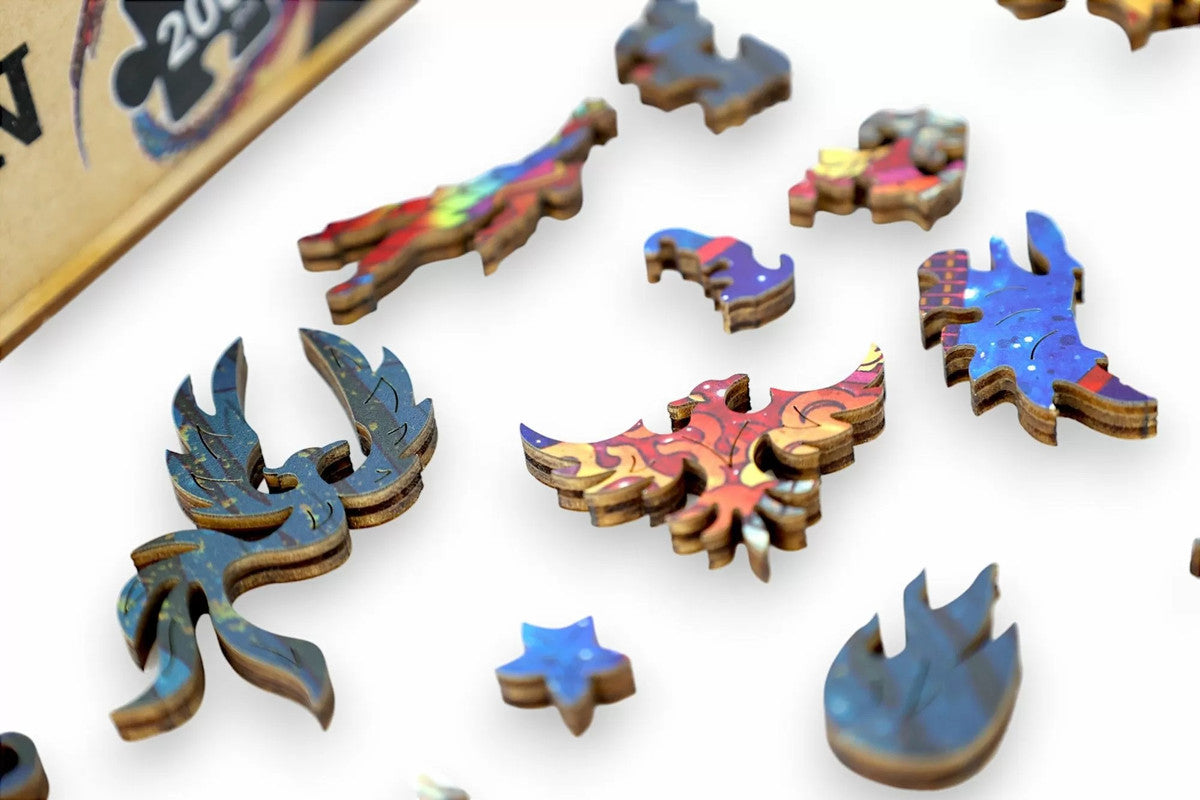 Colorful, uniquely shaped wooden puzzle pieces scattered on a white surface