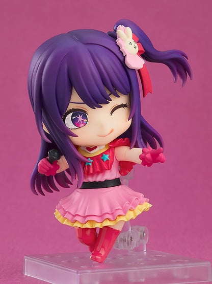Ai figure holding a microphone with alternate expression, capturing idol performance moment