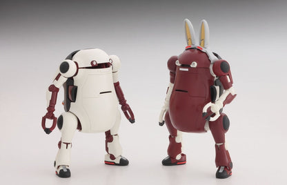 Two round robot model kits, one white and one maroon with large rabbit ears, standing side-by-side