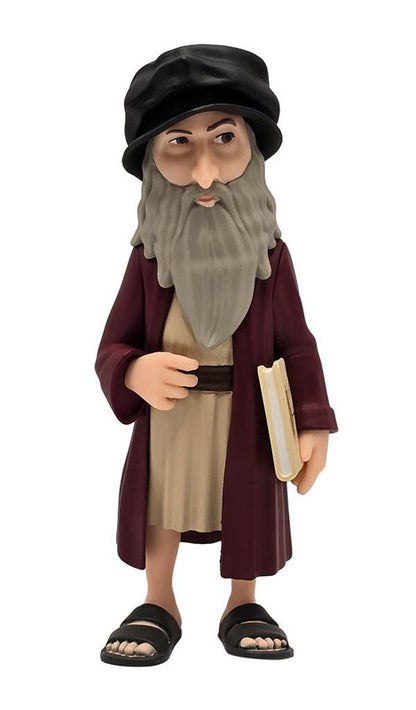 Minix Historical Leonardo da Vinci 67 collectible figure with grey beard black hat long maroon robe and tan tunic holding a book wearing sandals
