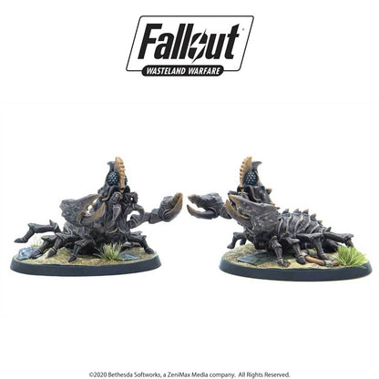 Pair of Fallout: Wasteland Warfare Radscorpion-like miniatures with large claws facing off on bases