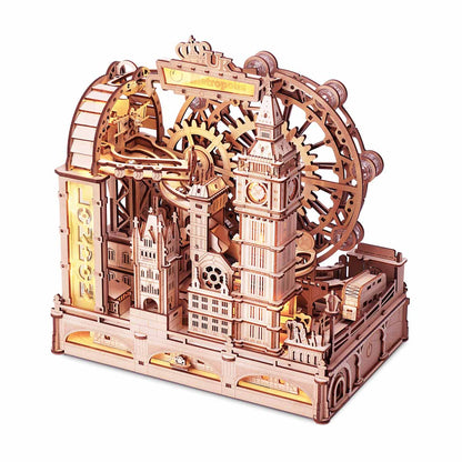 Illuminated wooden mechanical 3D model of London landmarks, including Big Ben, a Ferris wheel, and exposed gears