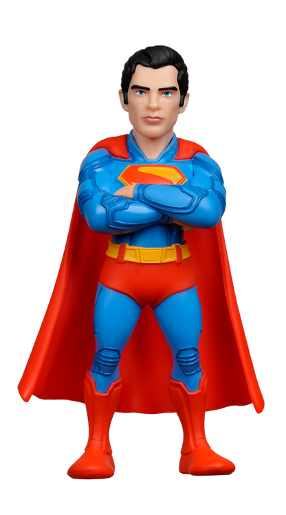 A MINIX DC Comics Superman 2025 Figure stands with crossed arms, wearing his blue suit, red cape, and iconic S shield