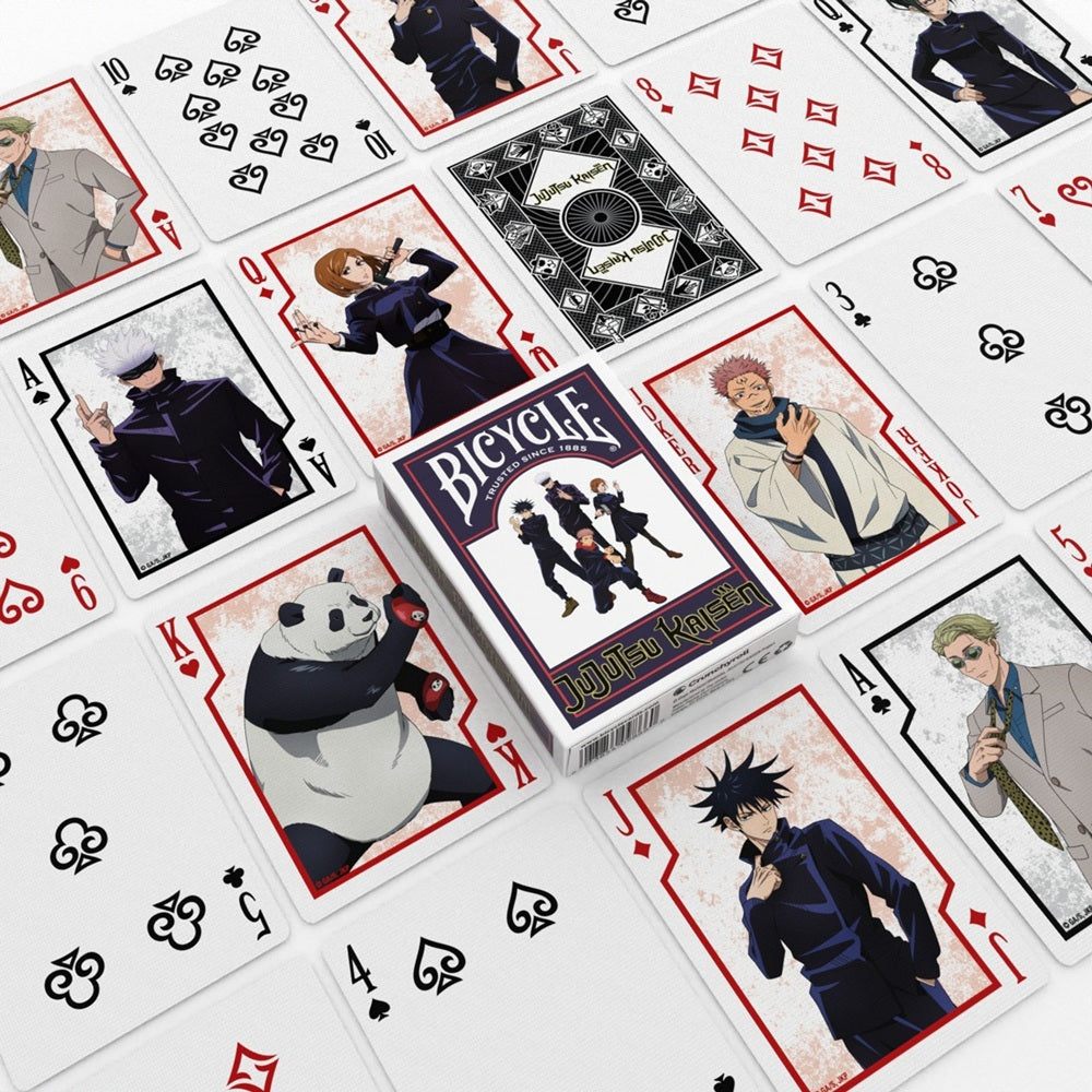 Bicycle playing cards themed around Jujutsu Kaisen characters, scattered around the main tuck box