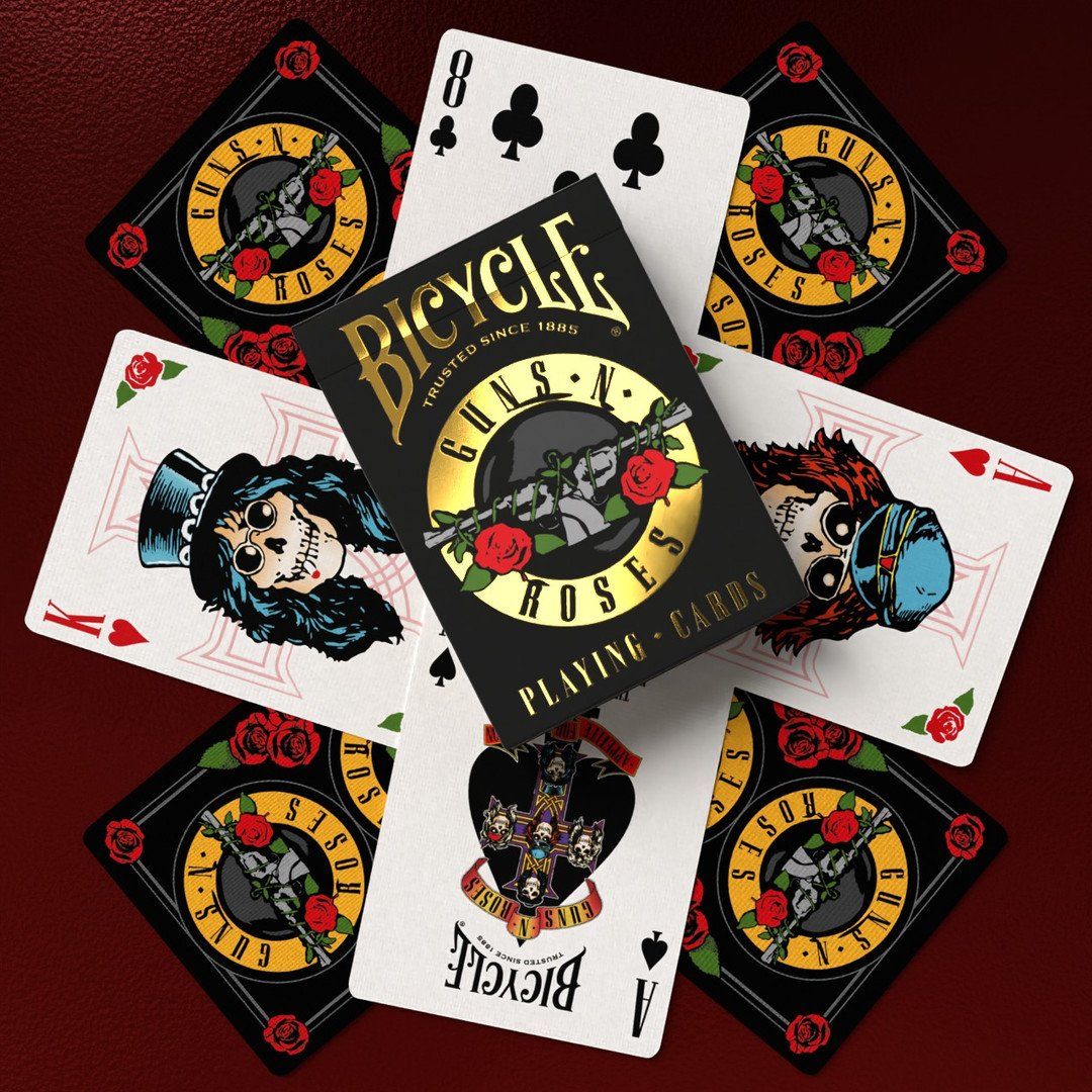 Guns N' Roses custom Bicycle playing cards spread out, showing the black tuck box and unique skull court cards