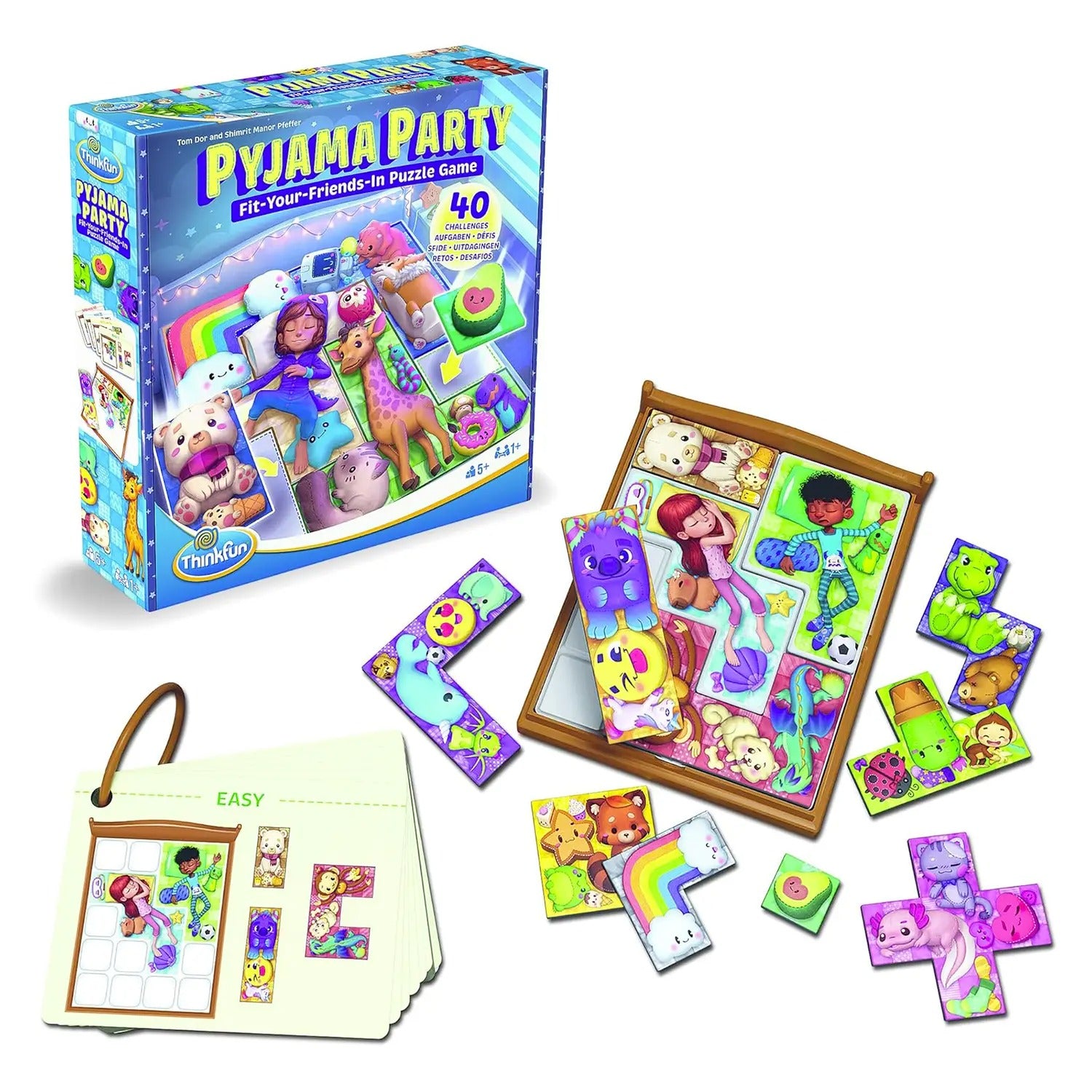 ThinkFun Pyjama Party children's puzzle game box, featuring colourful polyomino pieces, a wooden bed board, and challenge cards