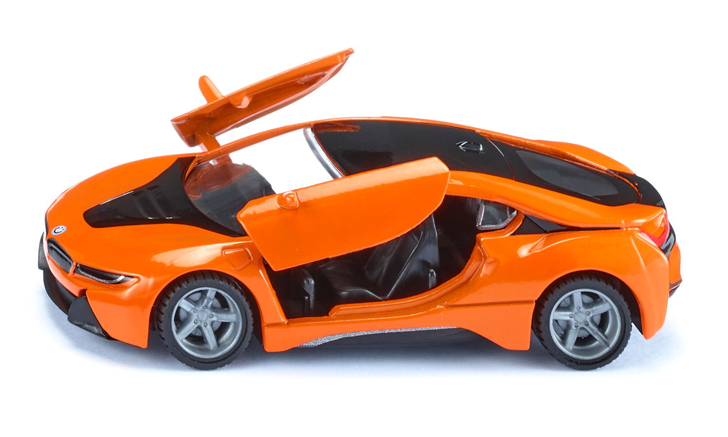 Orange toy sports car model with the driver's scissor door open, against a white background