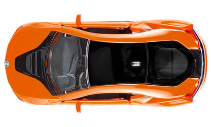 Orange sports car model with black details, viewed directly from above