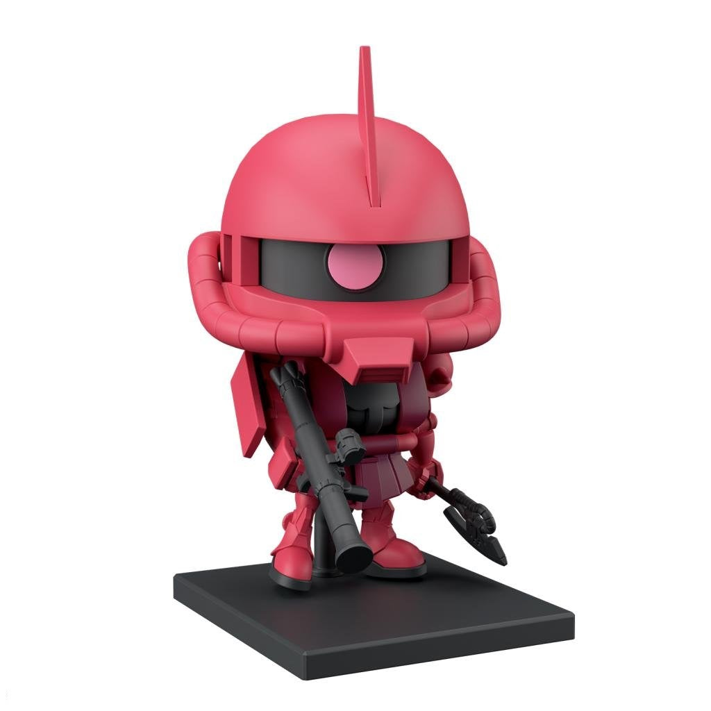 Red chibi Zaku II figure with a mono-eye and head spike, holding a rifle and axe on a black base