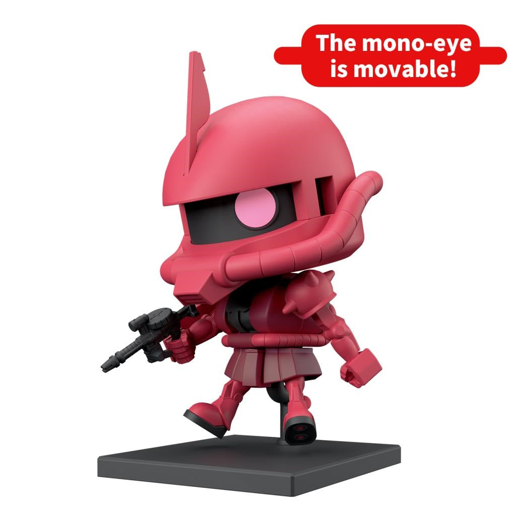 Red SD Zaku II Gundam figure with a movable pink mono-eye, holding a rifle on a black base