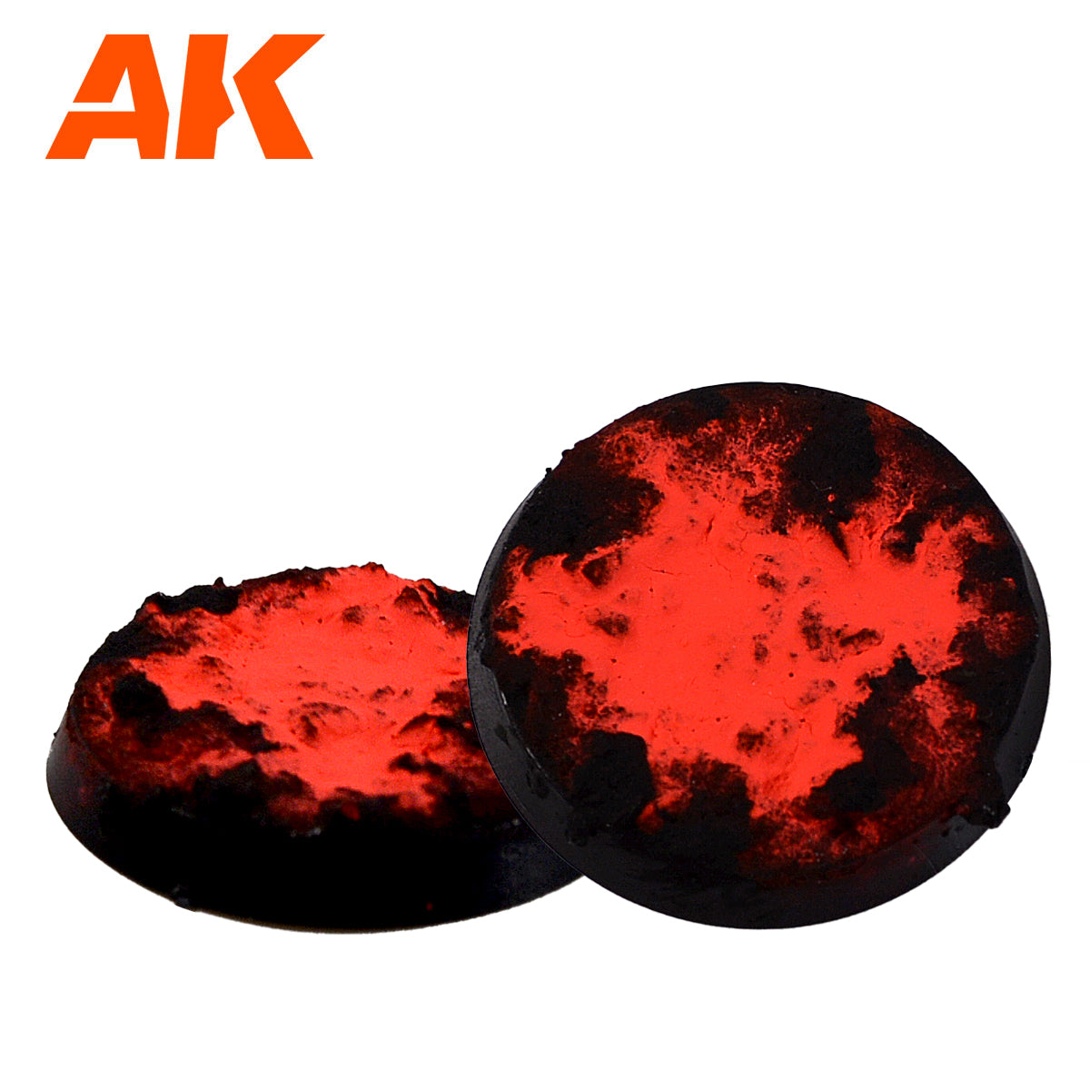 Two miniature bases, black with vibrant red lava effect