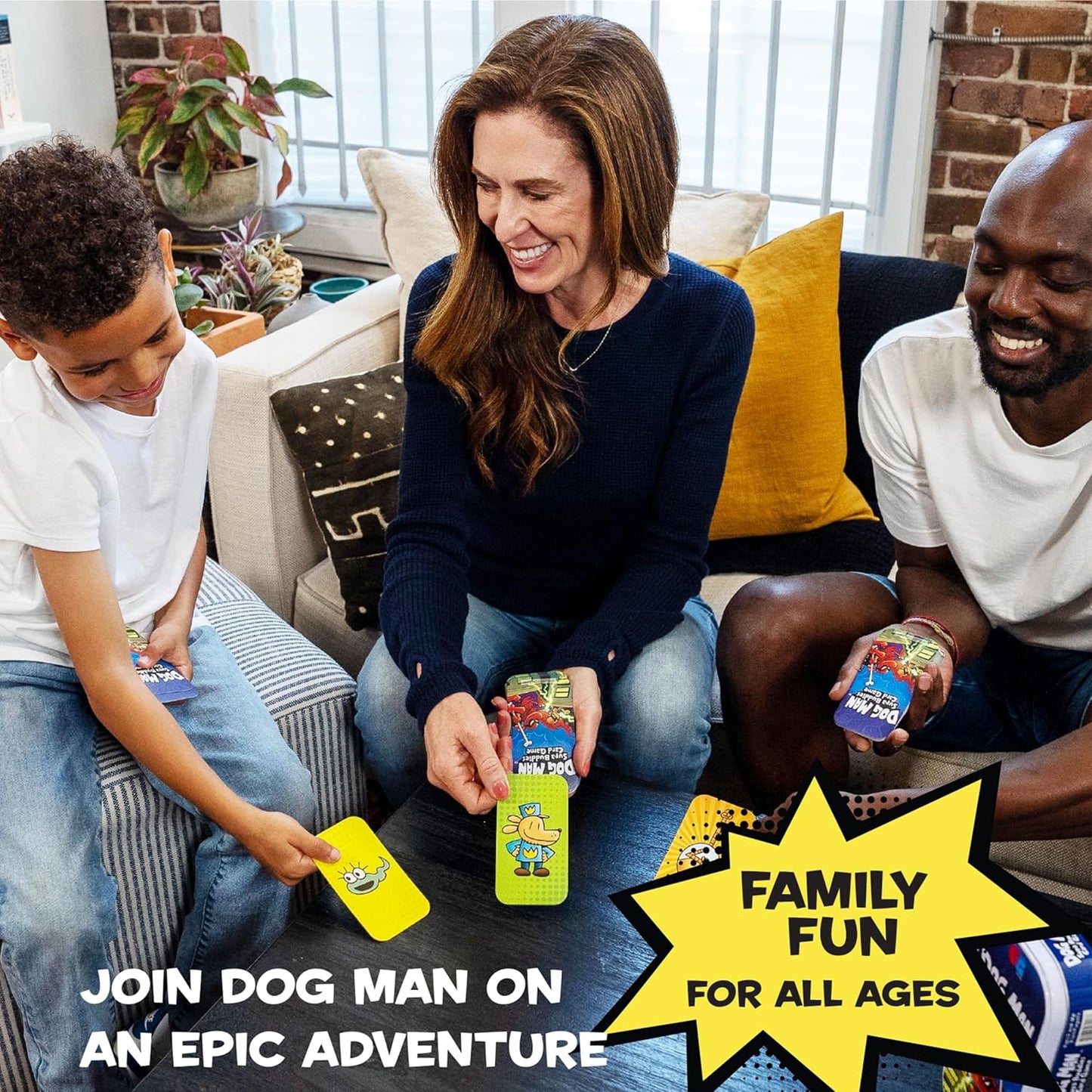 Diverse family playing the Dog Man card game, holding character cards and smiling happily