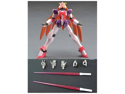 Pink, purple, orange mech figure with orange wings, posed dynamically with interchangeable hands and two red sabers