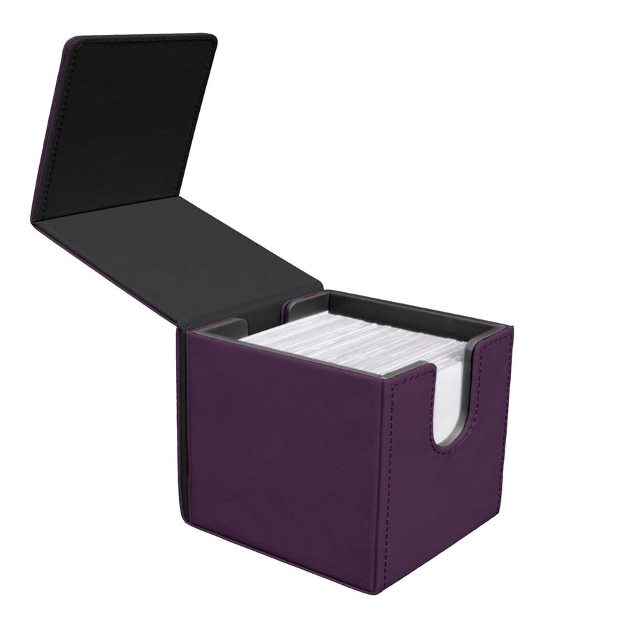 An open purple faux leather deck box with black interior, filled with white cards