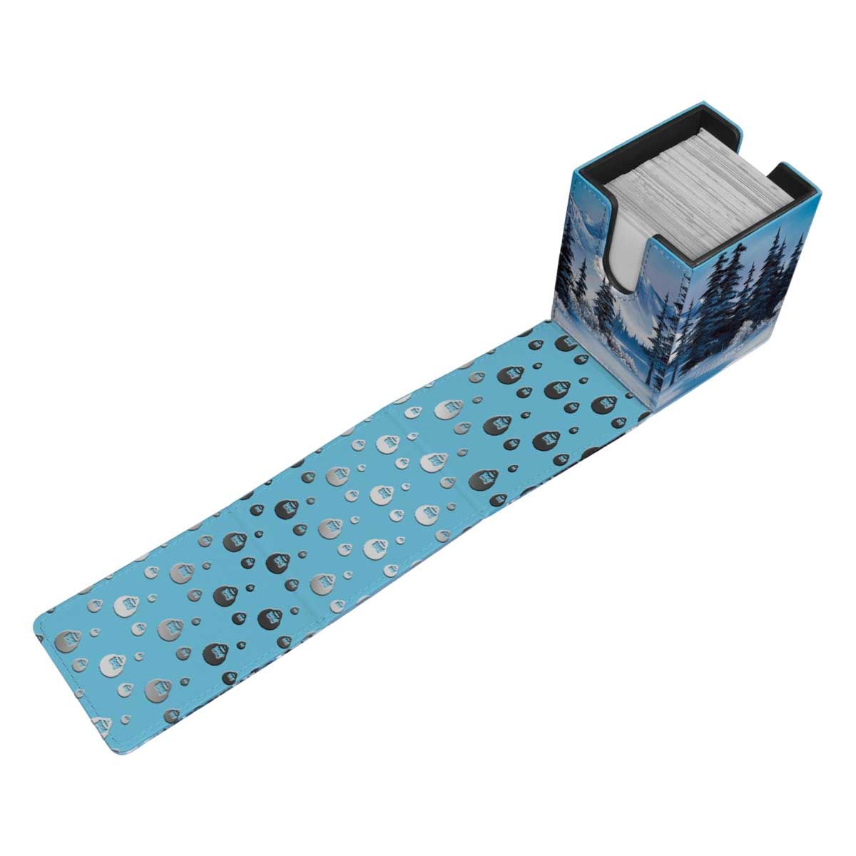 Deck box featuring a snowy pine forest design, open and holding cards, the attached mat is light blue with a repeating droplet pattern