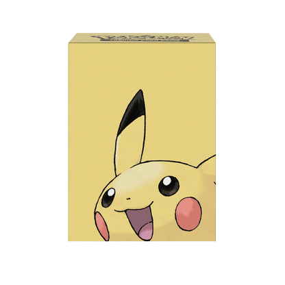Yellow TCG deck box featuring a large, grinning Pikachu face peeking up
