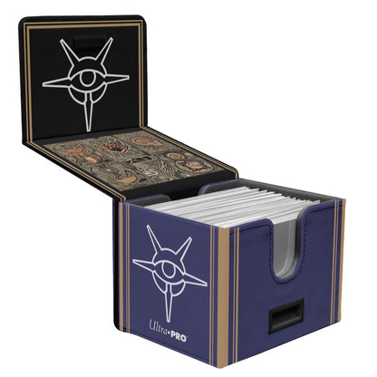 Blue Ultra Pro trading card game deck box with white Eye of Waking symbol and sleeved cards
