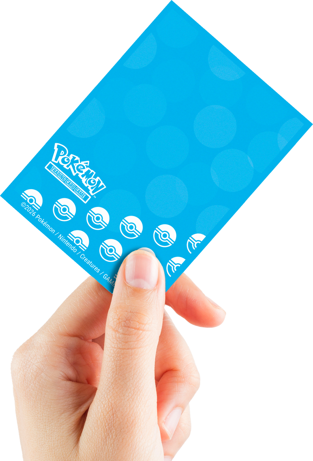 Pokémon TCG card sleeve held by a hand, showing the logo and Poké Ball icons