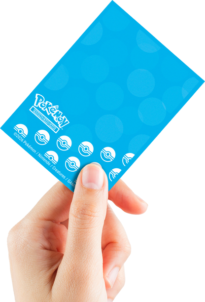 Pokémon TCG card sleeve held by a hand, showing the logo and Poké Ball icons