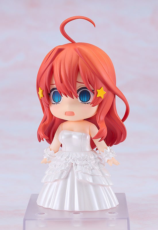 Itsuki Nakano Nendoroid posed sitting with gentle smile and bouquet resting on lap