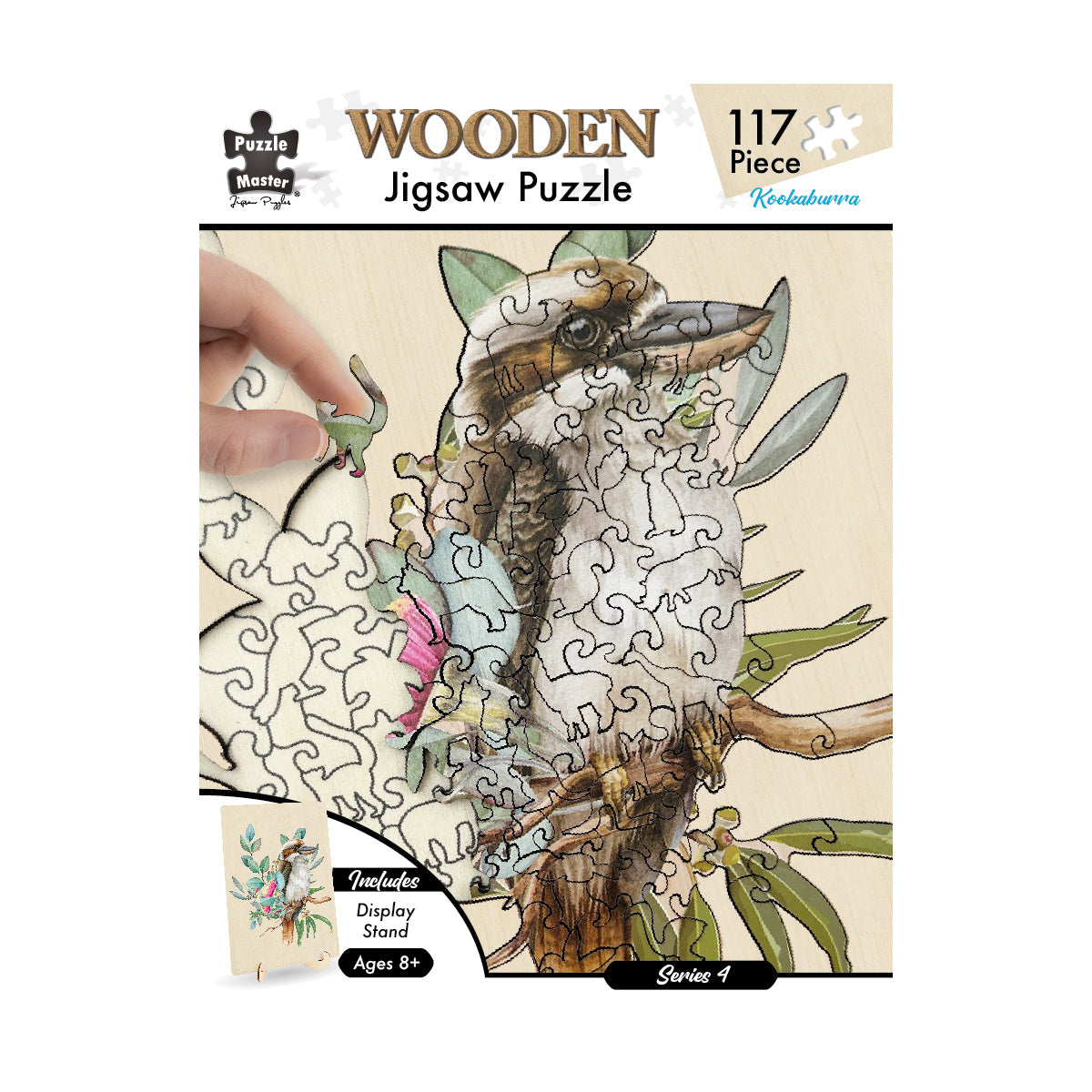 117-piece wooden jigsaw puzzle featuring a Kookaburra bird design, partially assembled, with a hand placing a dinosaur-shaped piece