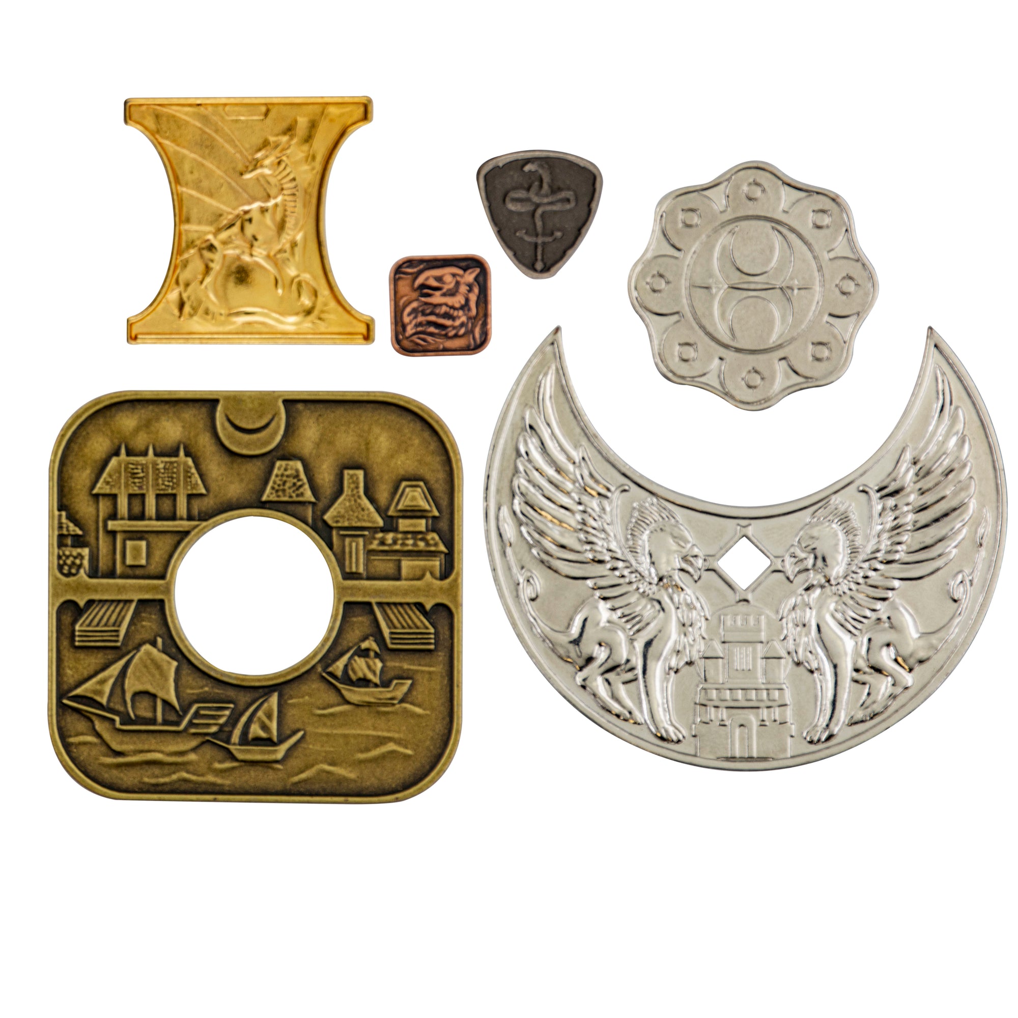 Various Dungeons and Dragons Waterdeep Coins with embossed designs of dragons, griffins, buildings, and boats on different shaped metal pieces