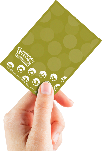 Pokémon TCG card sleeve held by a hand, showing the logo and Poké Ball icons