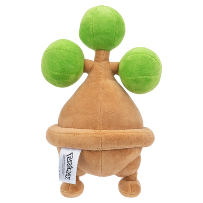 The plush features a brown, conical base and three fuzzy, bright green spherical shapes protruding from the top, photographed clearly on a white background