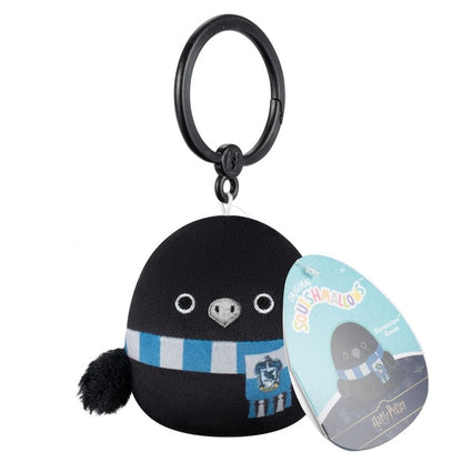 A black Squishmallows Raven mini clip from the Harry Potter collection wearing a blue and white Ravenclaw scarf attached to a black plastic key clip