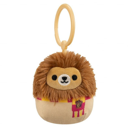 This Harry Potter Squishmallows mini clip is a plush Gryffindor Lion mascot wearing a red and gold scarf with an attached tan plastic clip with white background