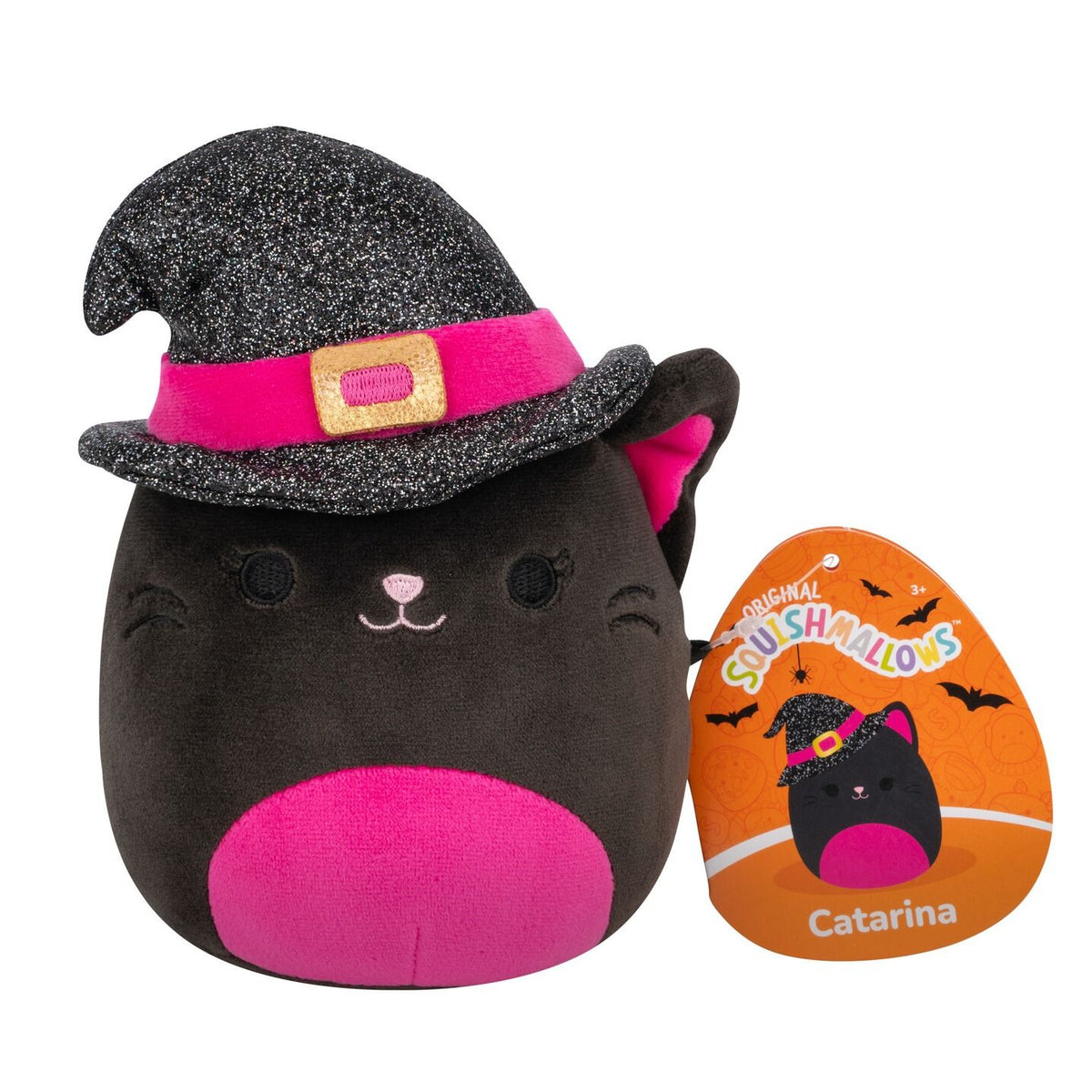 A black cat plush wearing a glittery witch hat with a pink band and gold buckle, pink inner ears and belly, and an orange product tag