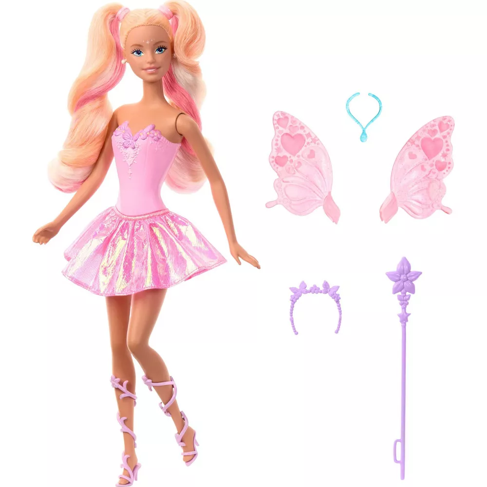 A Barbie doll with blonde and pink pigtails, wearing a shimmery pink fairy dress and sandals, displayed with separate pink butterfly wings, a blue necklace, purple tiara, and staff